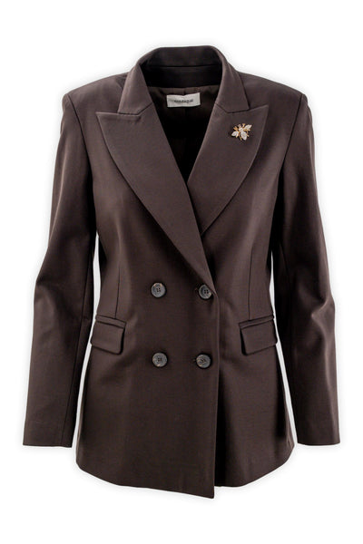Double-breasted blazer with peak lapels and jewel brooch